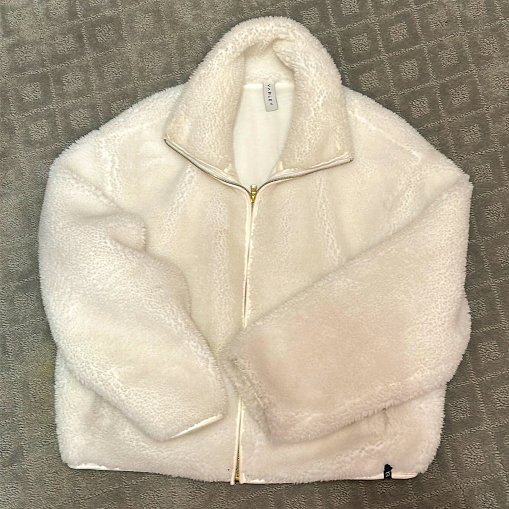 Varley brand white fleece jacket - Peloton limited edition.